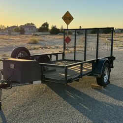 Utility Trailer With The Ramp