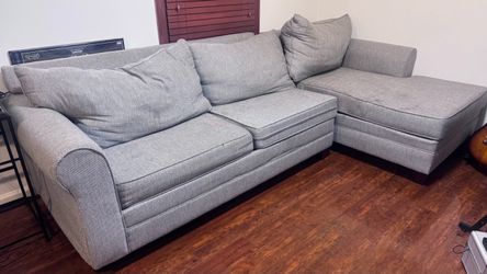 Modern Light Gray Sectional Sofa with Chaise – $450 OBO  Upgrade your living space with this stylish, spacious light gray sectional sofa. Featuring a 