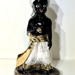 Vintage Mid Century Black Gold Pottery Boy Sabre Prince