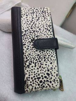 Fossil Erin Tab Wallet-Clutch in black and white cow hide.