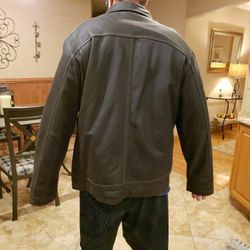 Mans leather jacket never worn too big. Columbia leather size 3XLT