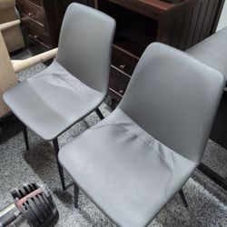 Set Of Dark Gray Armless Chairs. Leather Or Leather Like Material