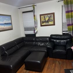 Black leather sectional + ottoman + armchair 