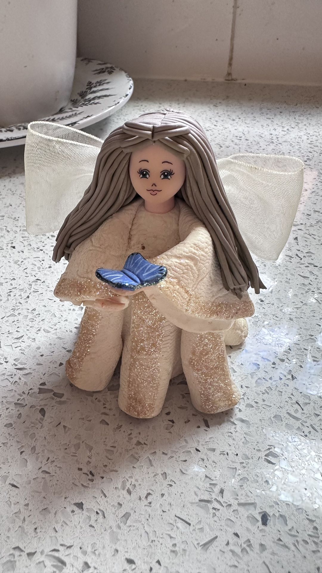 Handcrafted Angel Figurine with Blue Butterfly