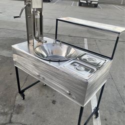 carrito para churros con churrera para 10 libras de masa y un caso de acero inoxidable