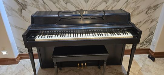 Lowrey upright piano with matching bench