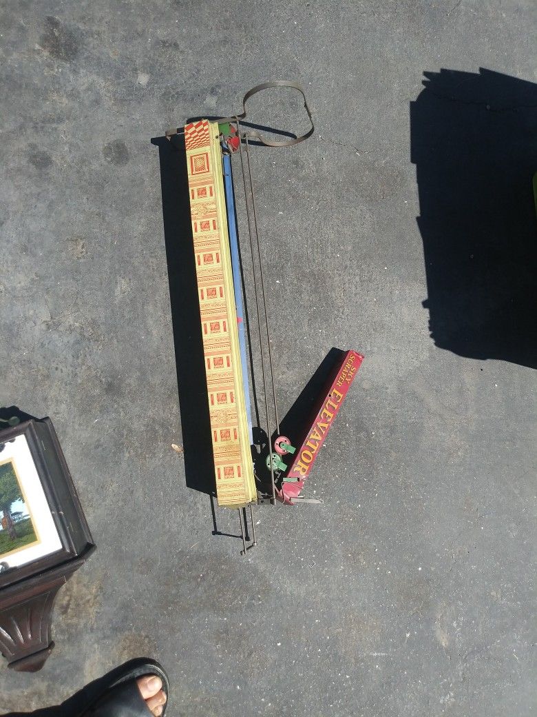 Antique Vintage Sky Scraper Wolverine Elevator Tin Toy