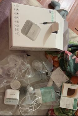 Electric breast pump and manual