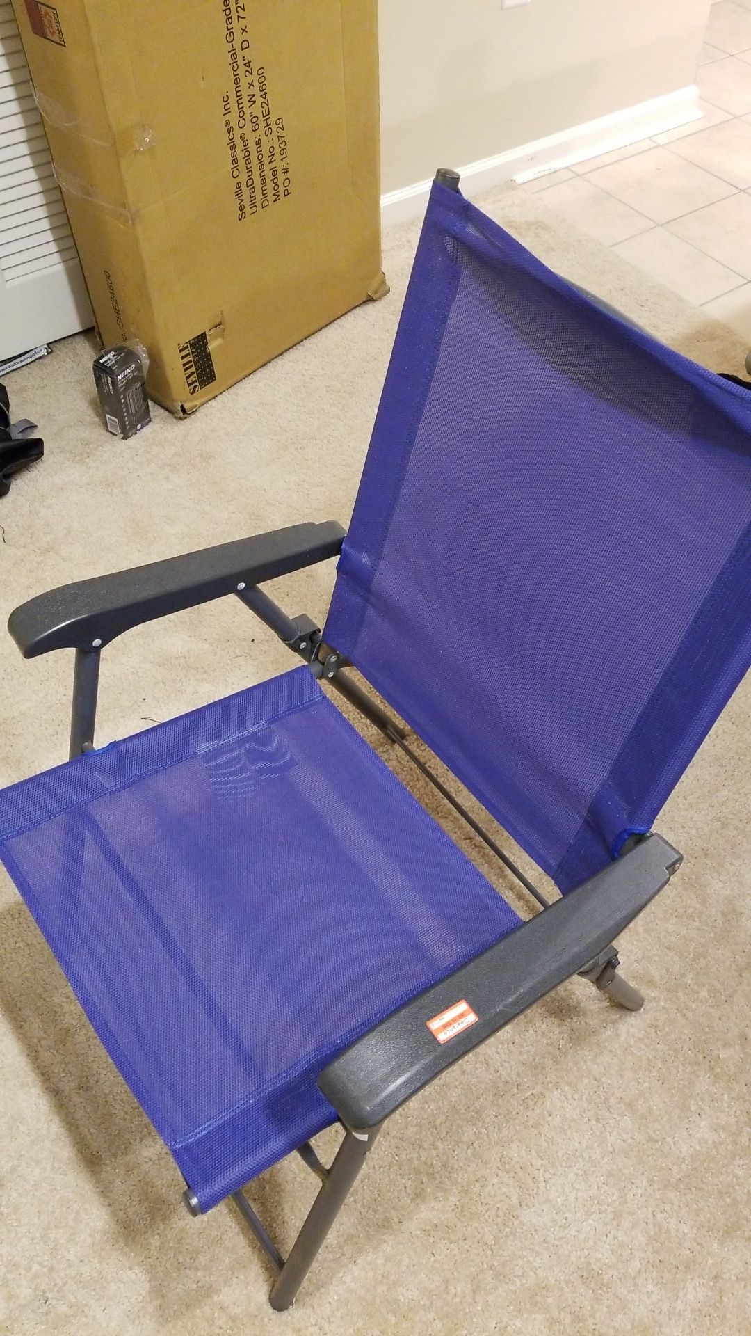 Blue folding beach chair
