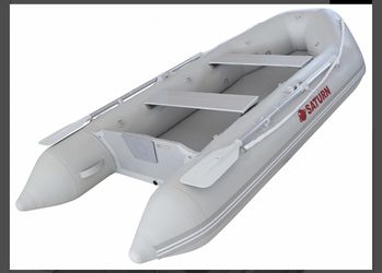 9.6 foot inflatable boat,motor, and battery!