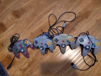 4 Nintendo 64 Controllers PRICE FIRM NON NEGOTIABLE