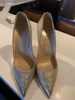 Christian Louboutin Gold glitter pumps