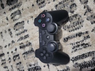 ORIGINAL PS3 CONTROLLER AND POWER A PS3 CONTROLLER
