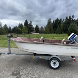 10’ Sorenson fiberglass fishing boat, 7.5 Hp Evinrude outboard motor and galvanized Spirit trailer