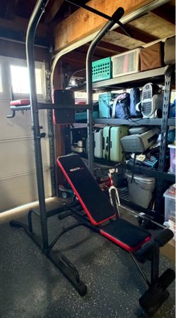 Weight bench, pull up bar power tower, spin bike and rowing machine