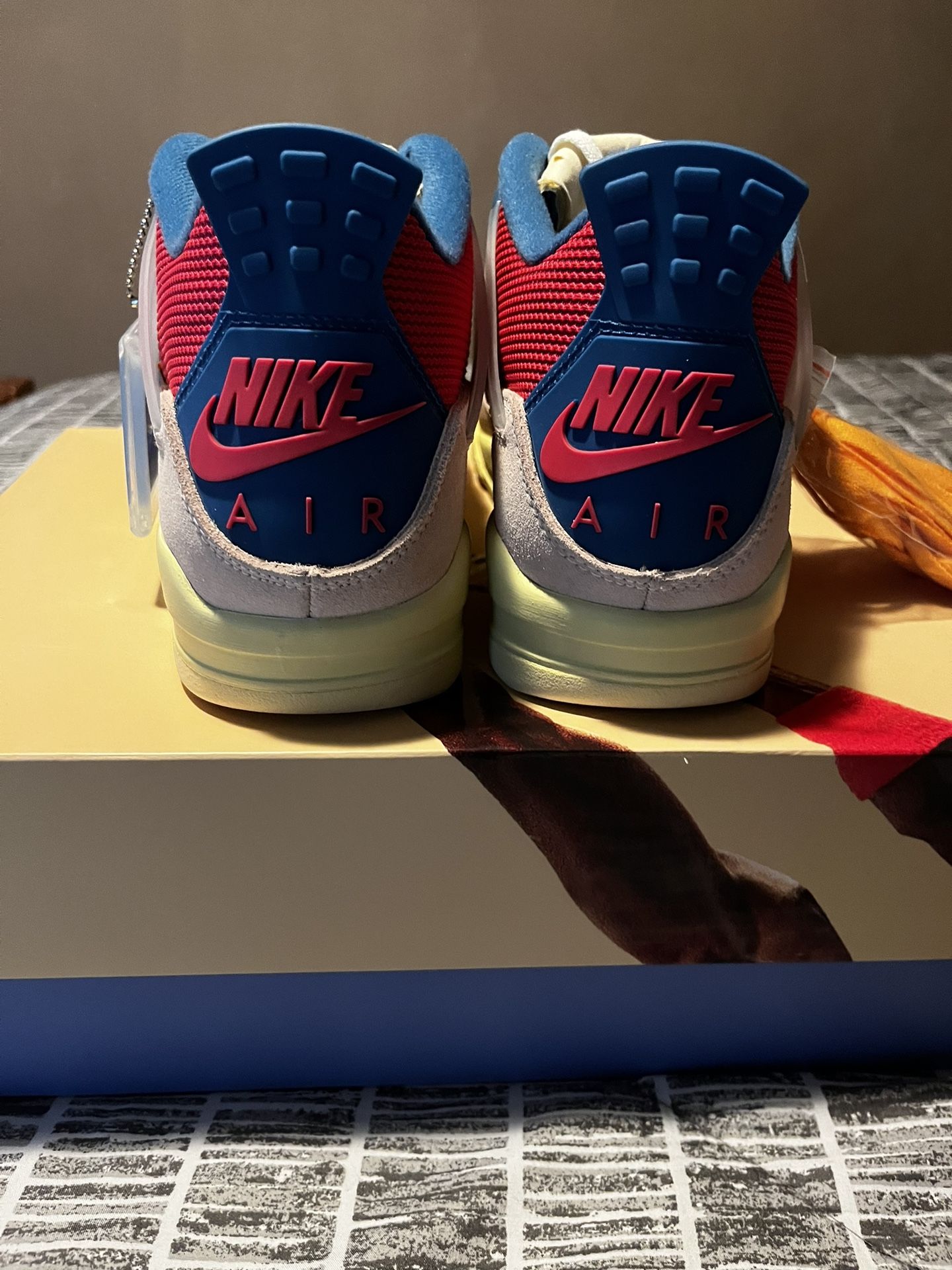 Air Jordan 4 Retro Guava Ice Union