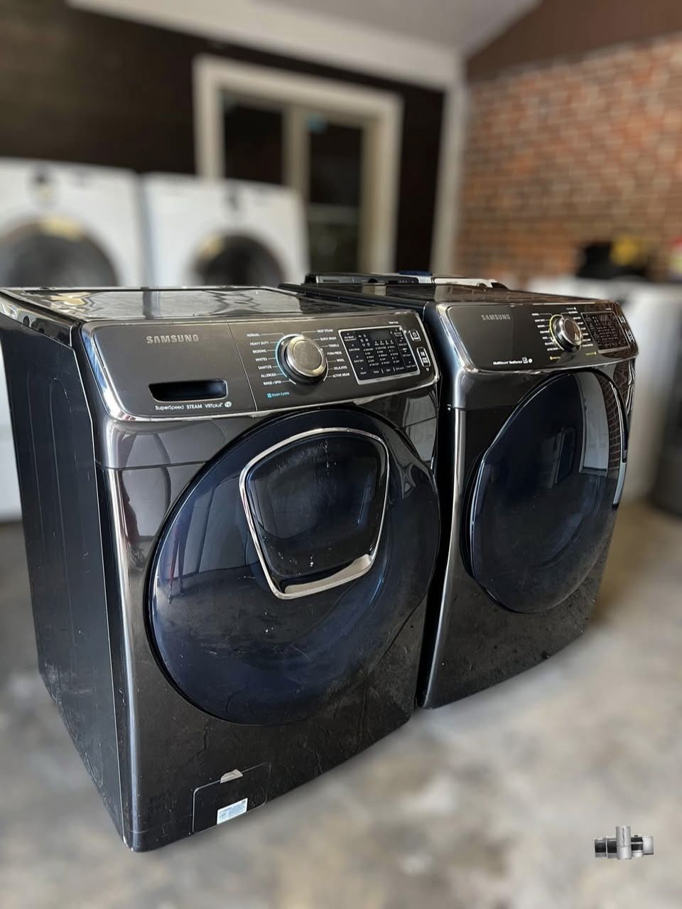 Samsung washer and electric dryer set. 