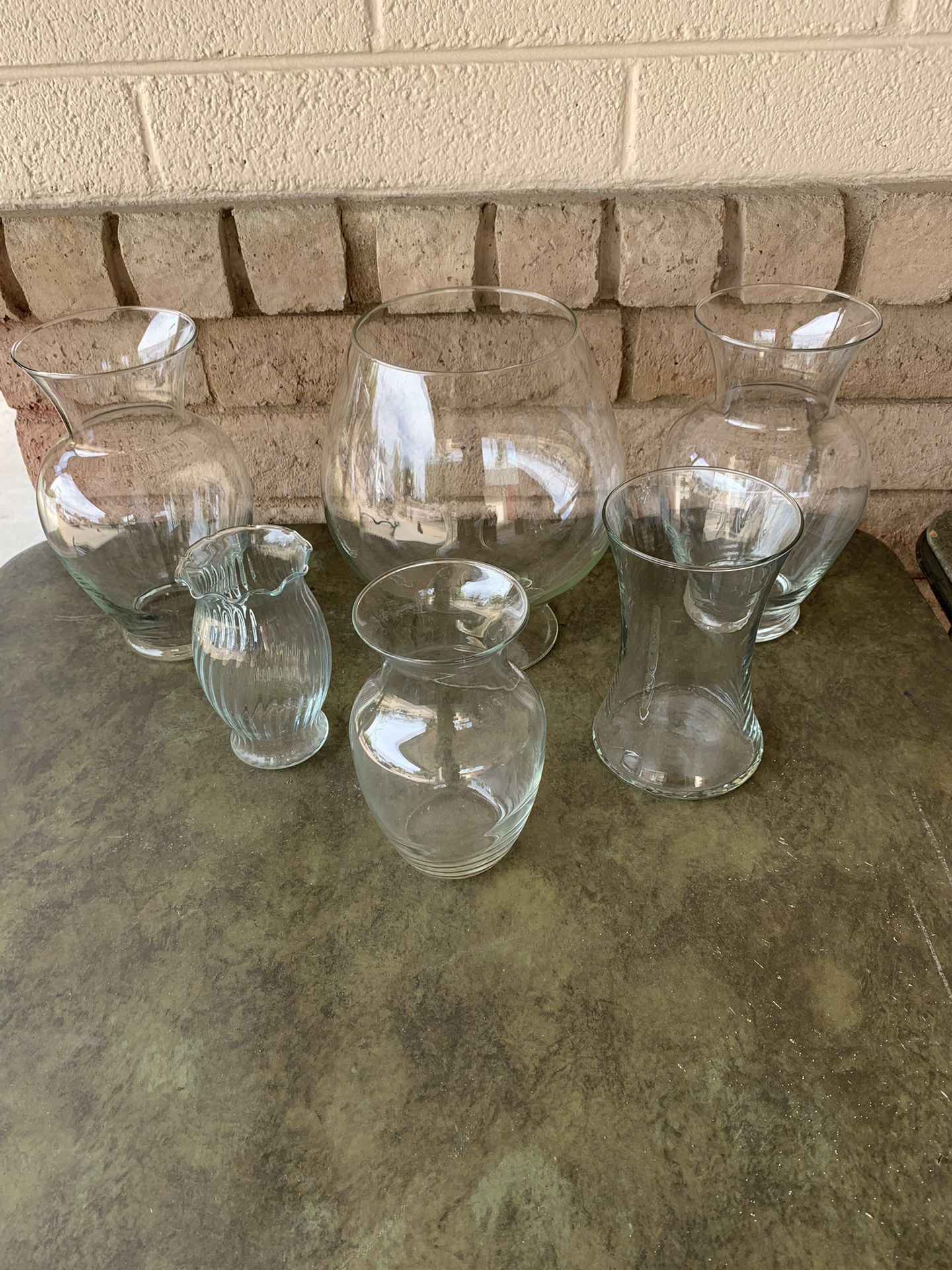 Six Glass Vases in Various Sizes