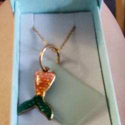 Goldtone Mermaid Tail Necklace. 