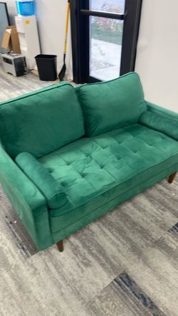 Green loveseat couch sofa