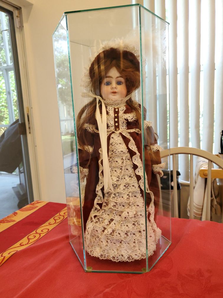 Collectible Doll in glass case