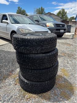 4 Studded Snow Tires + Steel Rims