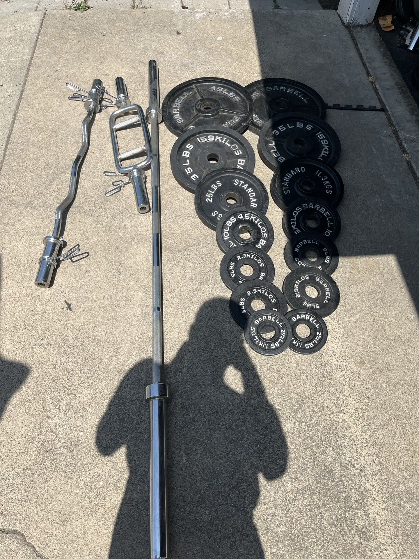 Olympic Weights Plus Barbells