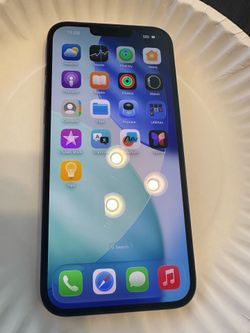 Unlocked iPhone 14 Plus with charger