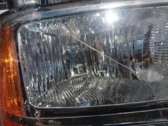 09 GMC Sierra. headlights and grill