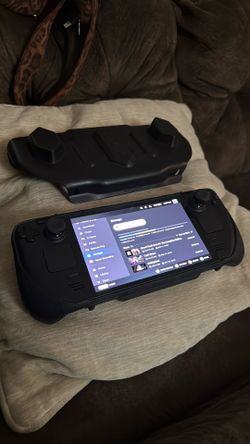 STEAM DECK OLED 512gb with 128gb card included.