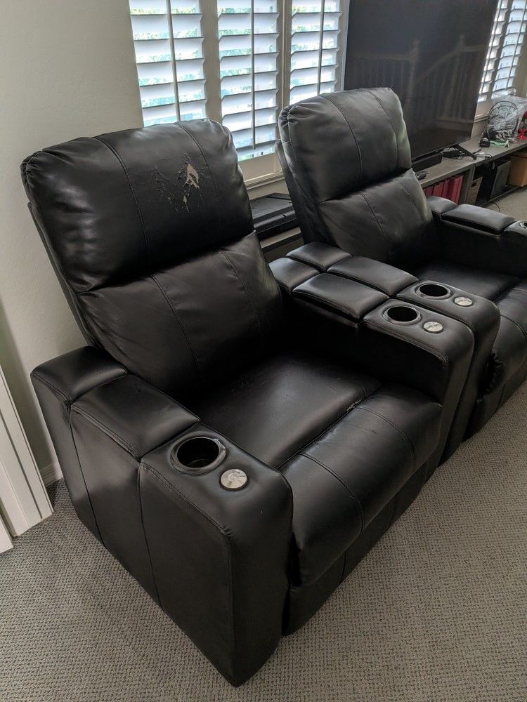 Two Black Faux Leather Power Recliner Chairs With Rotating Table, USB Outlets, And Cup Holders