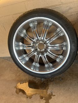 Five lug universal Chevy rims and tires