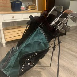 2 Sets Of Golf Clubs