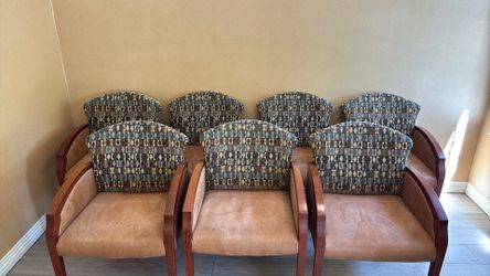 Seven custom office or lounge chairs