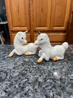 Vintage Ceramic Unicorn Pair of Salt and Pepper Shakers with Stoppers. Brand new never used. On the bottom in pencil is the name of the person who g