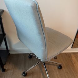 Grey rolling desk chair