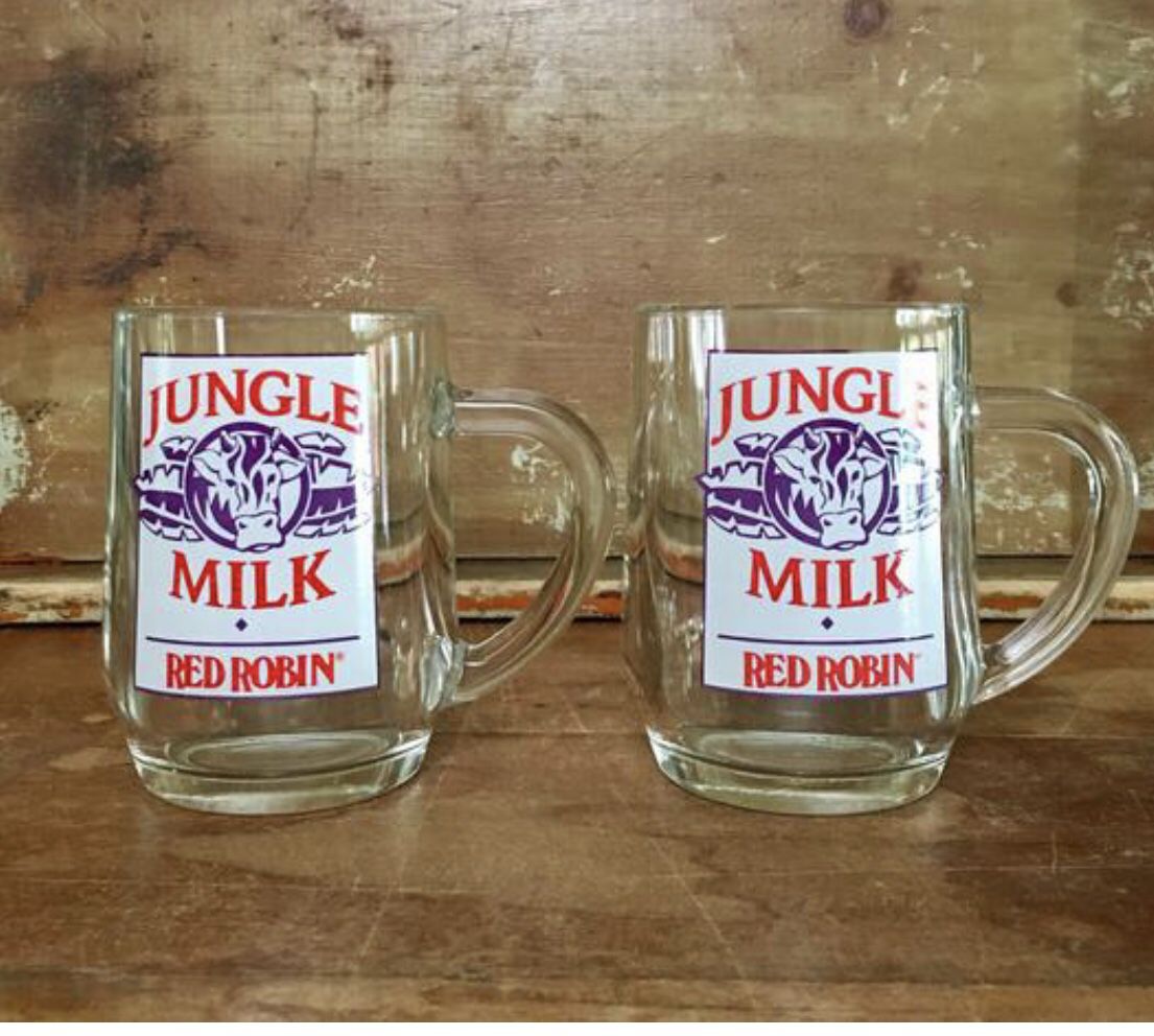 American vintage set of two Jungle Milk collectibles.. glass mugs