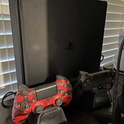 PlayStation 4 With Games And Controllers