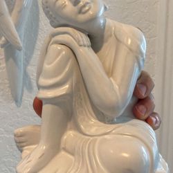Blue Or White Zen Buddha $25 Each.   Blue & White Ginger Jar $40.  Gray & Black Camel $25. 