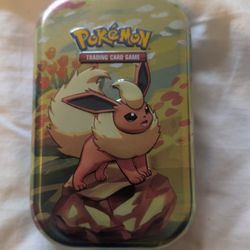 Pokemon Prismatic Evolutions Flareon Tin