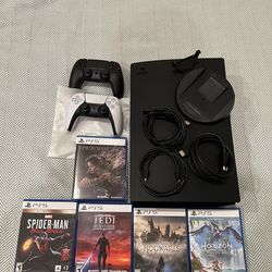 PS5  - 2 TB SSD- 2 controllers- 5 Games 