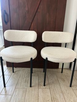 White boucle dining chairs