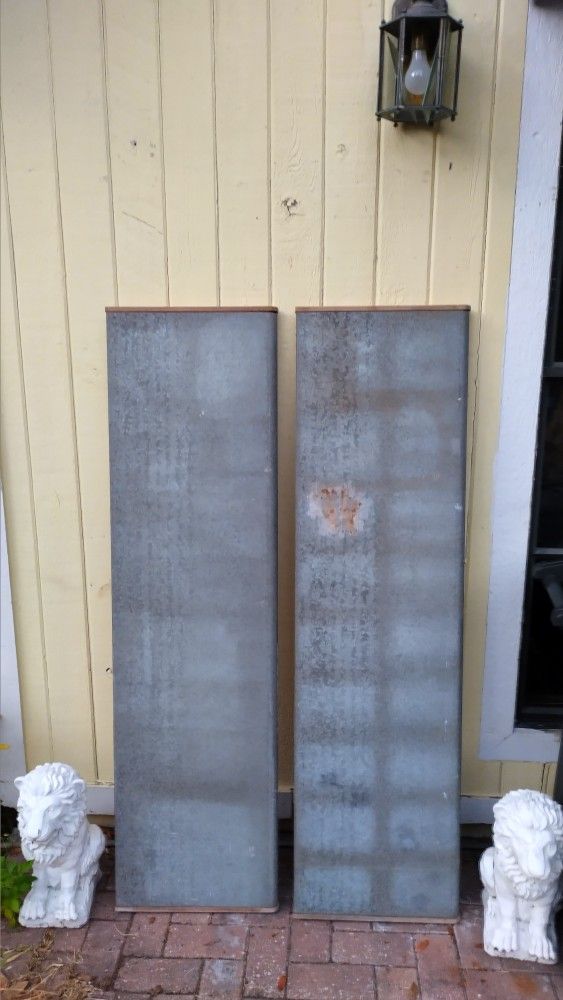 Two Heavy Duty Metal Covered Shelves