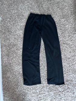 black sweatpants with elastic waistband