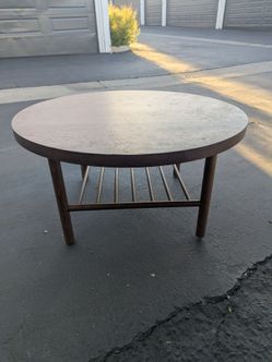 Round wooden coffee table