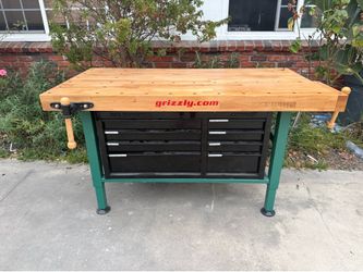 Wood working table with tool box