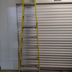 Two Ladders For Sale (1) 8' Fiberglass (2) 10' Wooden