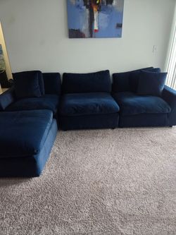 Blue suede couch and End Tables