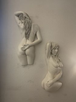 Two Female Form Wall Sculptures