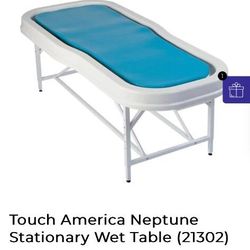 Massage table